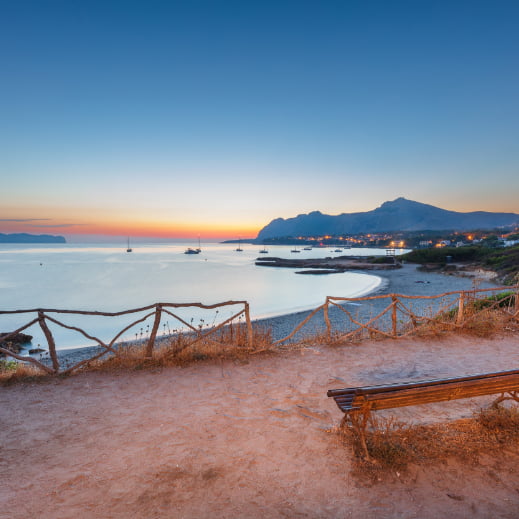 Bench and a viewpoint in Alcudia with the sunset as a backdrop