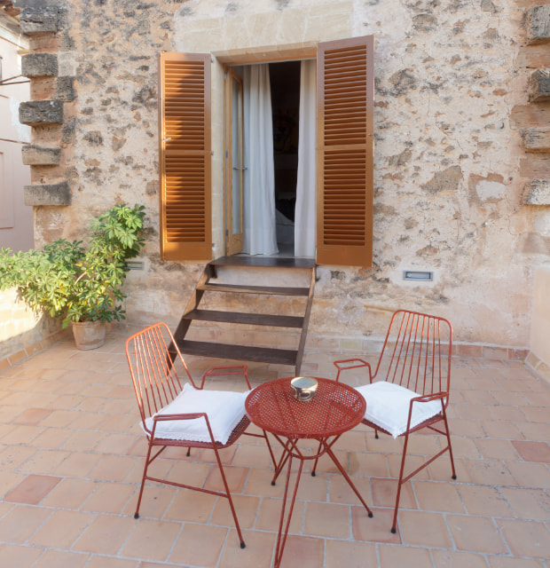 Terrace of one of the rooms of the hotel Can Tem